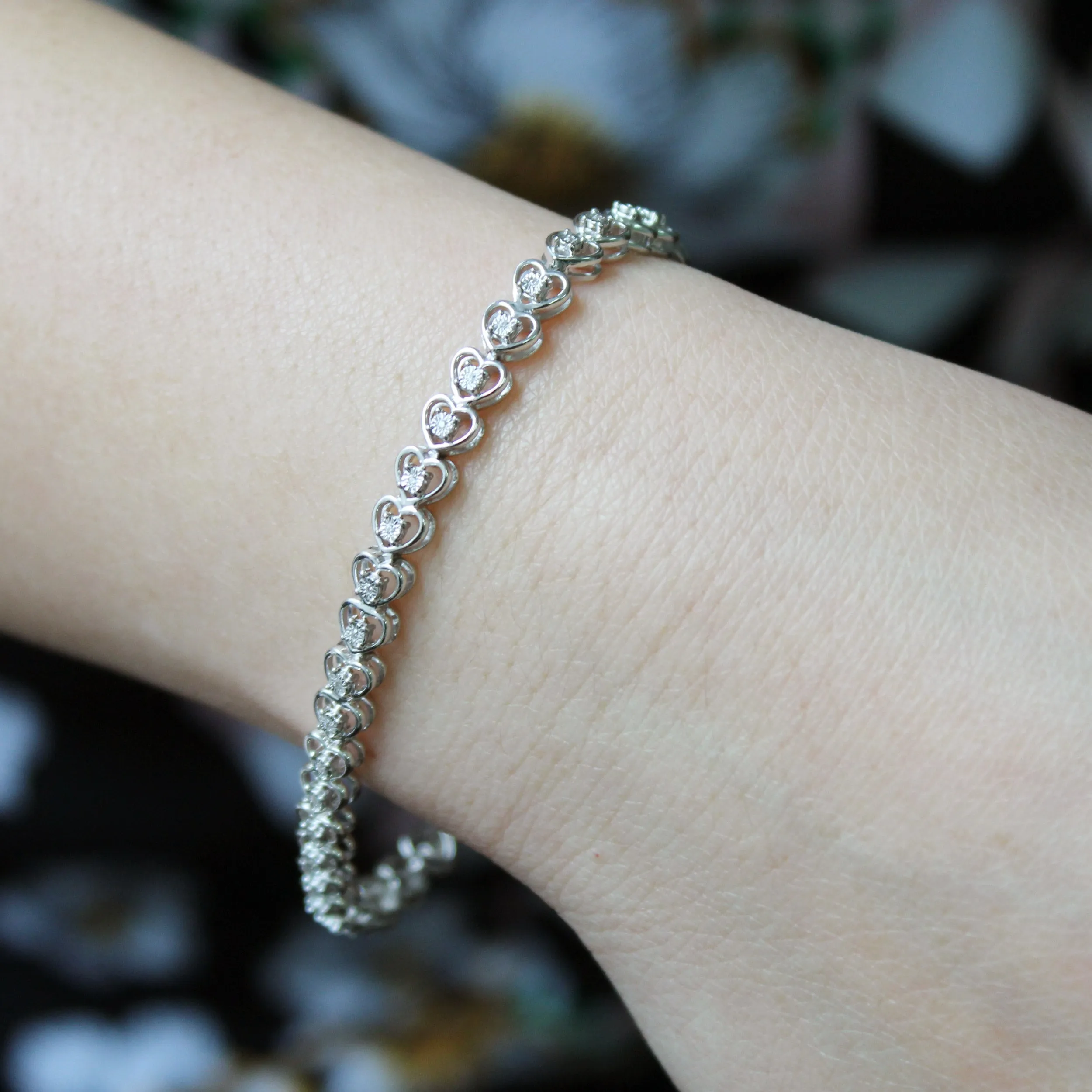 1/8ct tw Diamond Infinity Heart Tennis Bracelet in Sterling Silver