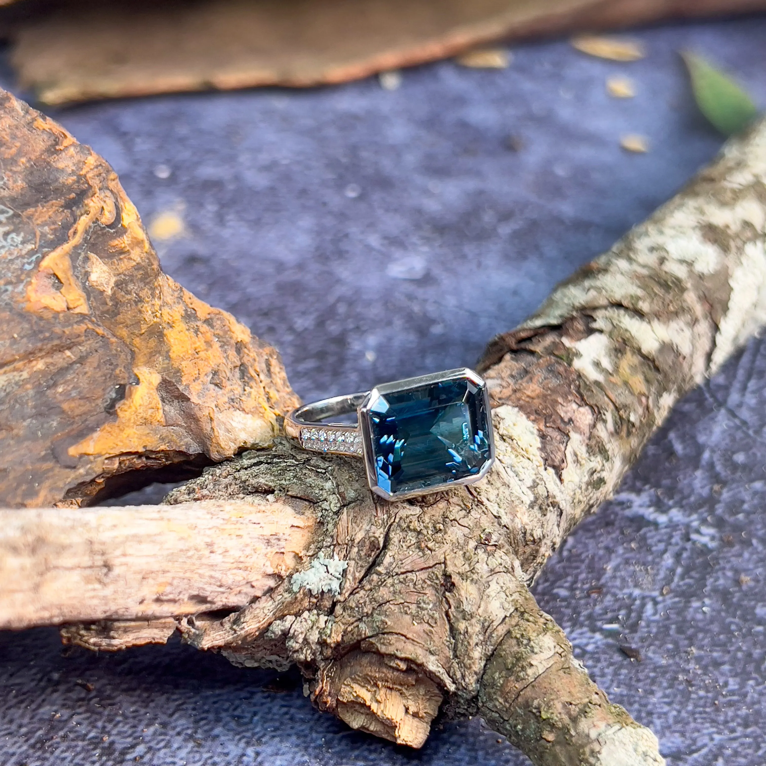 18kt White Gold London Blue Topaz 7.4ct and Diamond ring horizontal set