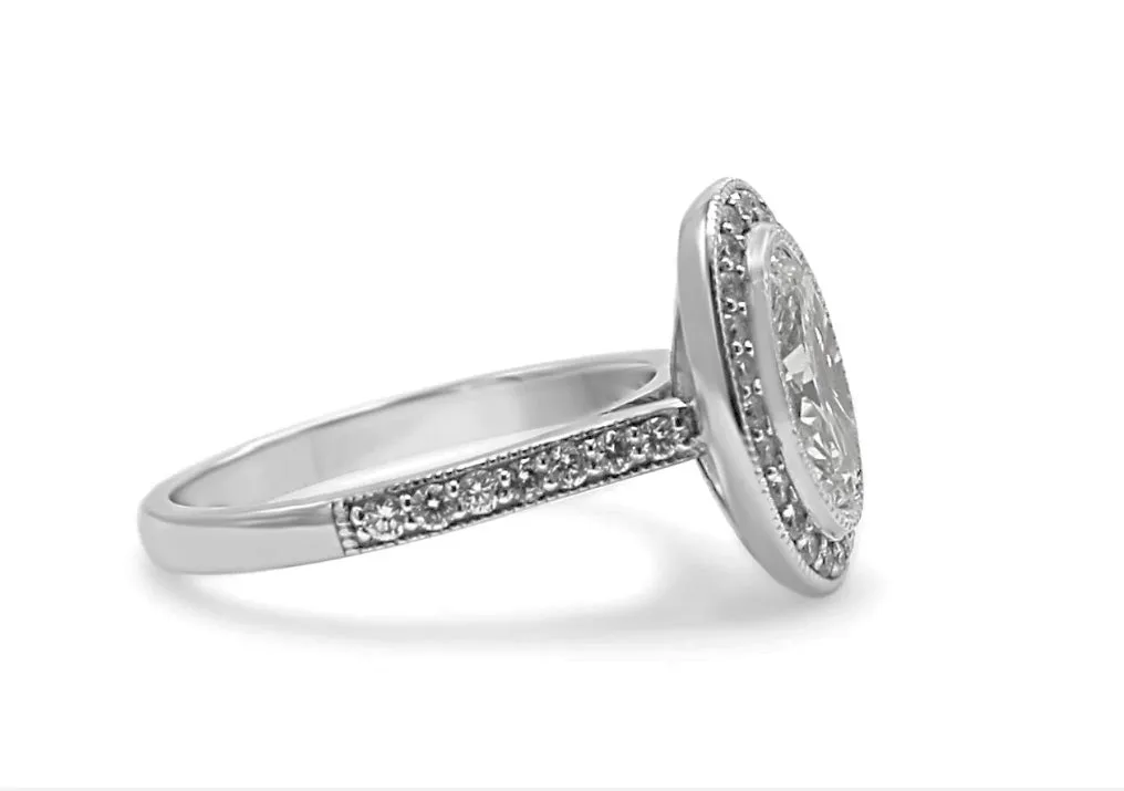 Oval Brilliant Solitaire Halo Set Diamond Ring
