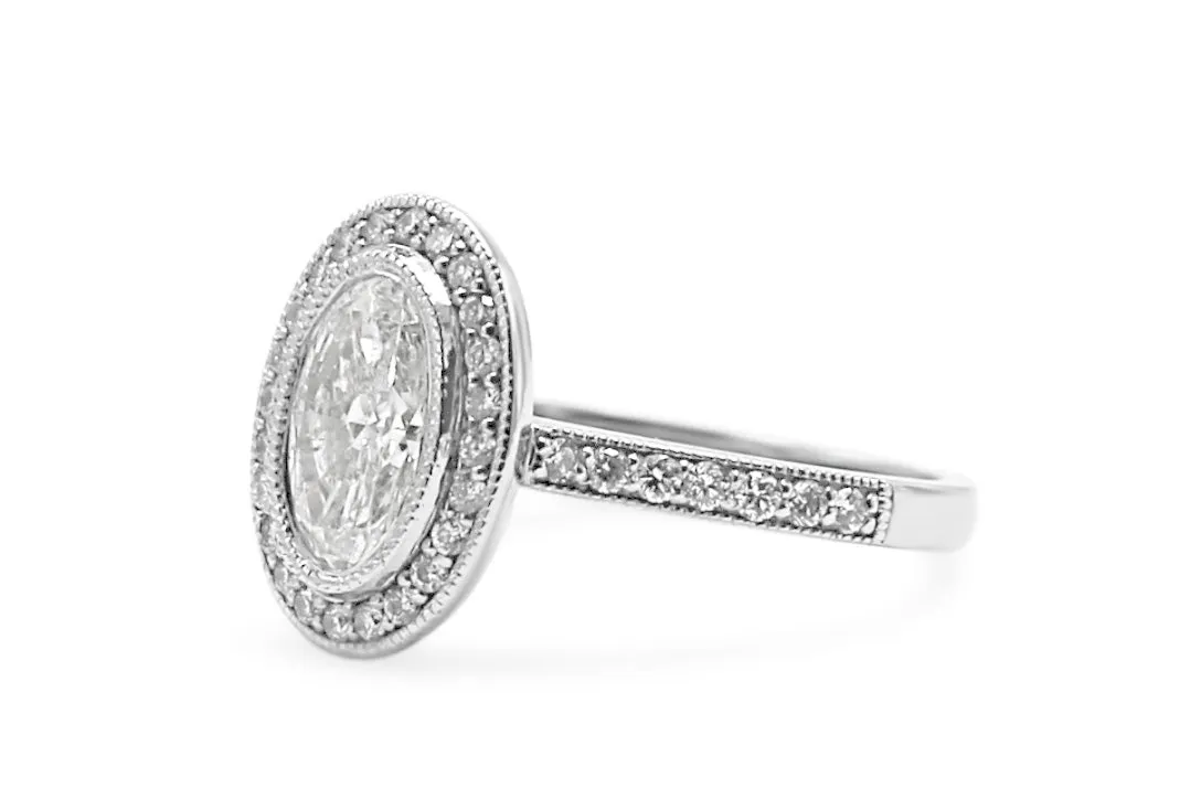 Oval Brilliant Solitaire Halo Set Diamond Ring
