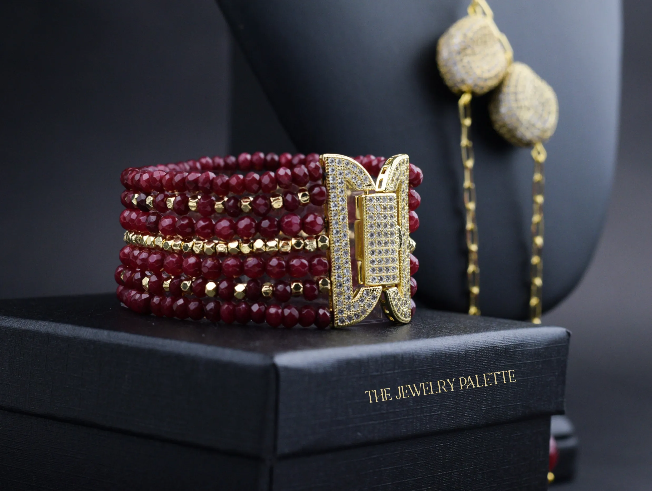 Roxanne luxe maroon gemstones and gold multitier bracelet